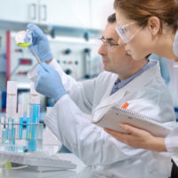 scientists working at the laboratory scientists working at the laboratory