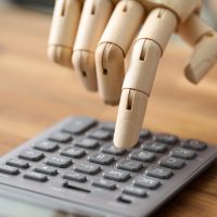 Calculator on wooden desk