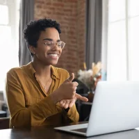 smiling-person-wearing-glasses