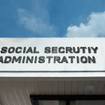 social-security-administration-word-signage-on-a-government-building-under-a-blue-sky
